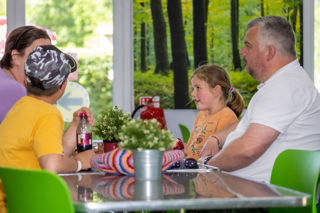 Family eating the the Forest Kitchen Restaurant at New Forest Wildlife Park